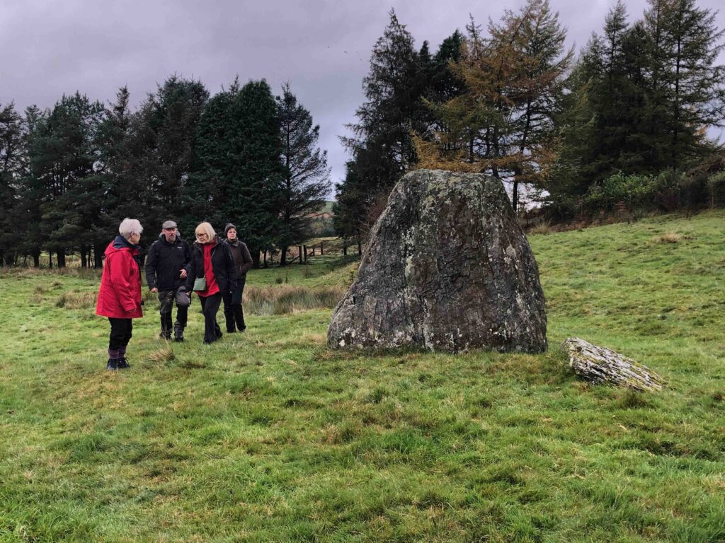 Group at standing stone